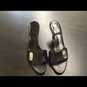Gucci black leather slides